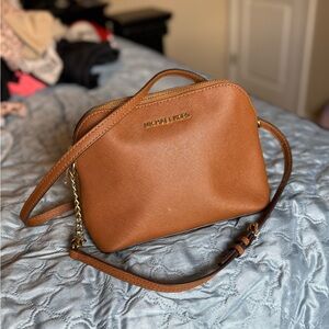 Michael Kors Tan Crossbody Bag with Adjustable Strap and Structured Design